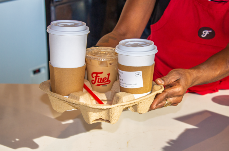 Fuel Coffee Franchise Worker Delivering Coffee Order